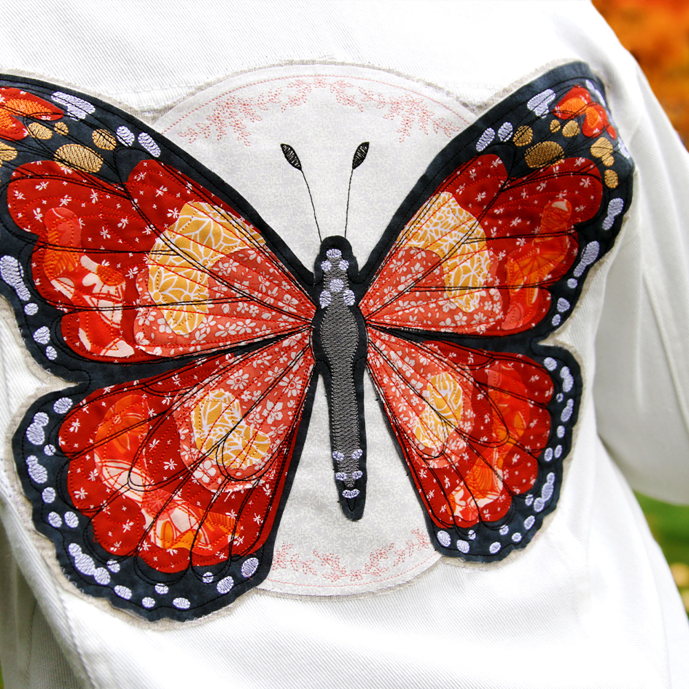 New Applique Butterfly - image features: Butterfly on white denim jacket