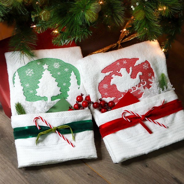 embossed designs - Tree and Santa's sleigh on white bath towels