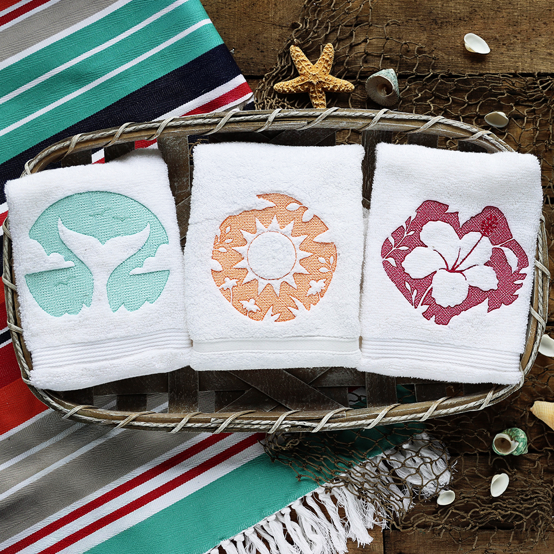 Summer of Stitching - image features: Embossed summer designs on towels - click here to shop